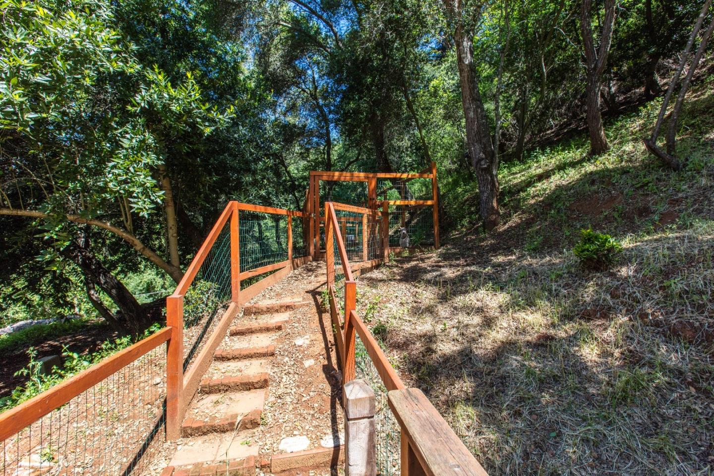 21477 Old Mine Road Los Gatos, CA 95033 - Photo 26 of 27 a backyard of a house with seating space
