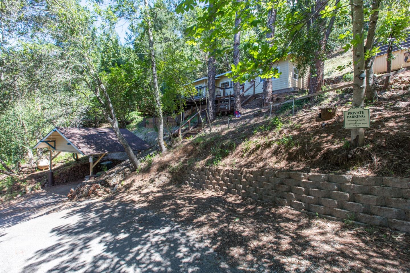 21477 Old Mine Road Los Gatos, CA 95033 - Photo 27 of 27 a backyard of a house with lots of green space
