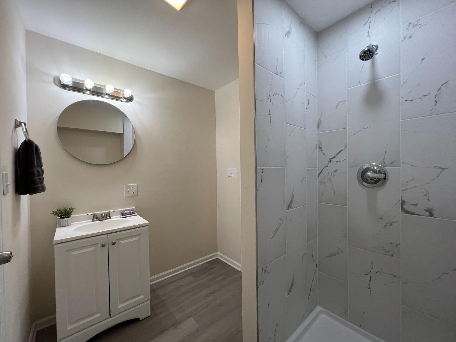 237 Krouser Drive Valparaiso, IN 46385 - Photo 15 of 31 a bathroom with a sink and a mirror