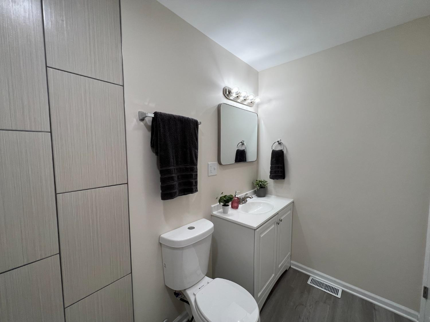 237 Krouser Drive Valparaiso, IN 46385 - Photo 21 of 31 a bathroom with a sink toilet and shower
