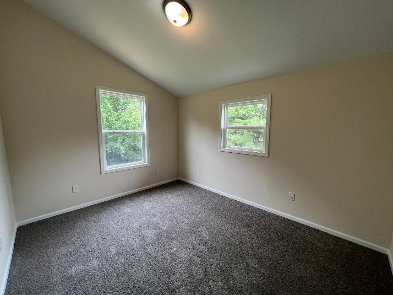 237 Krouser Drive Valparaiso, IN 46385 - Photo 23 of 31 an empty room with windows