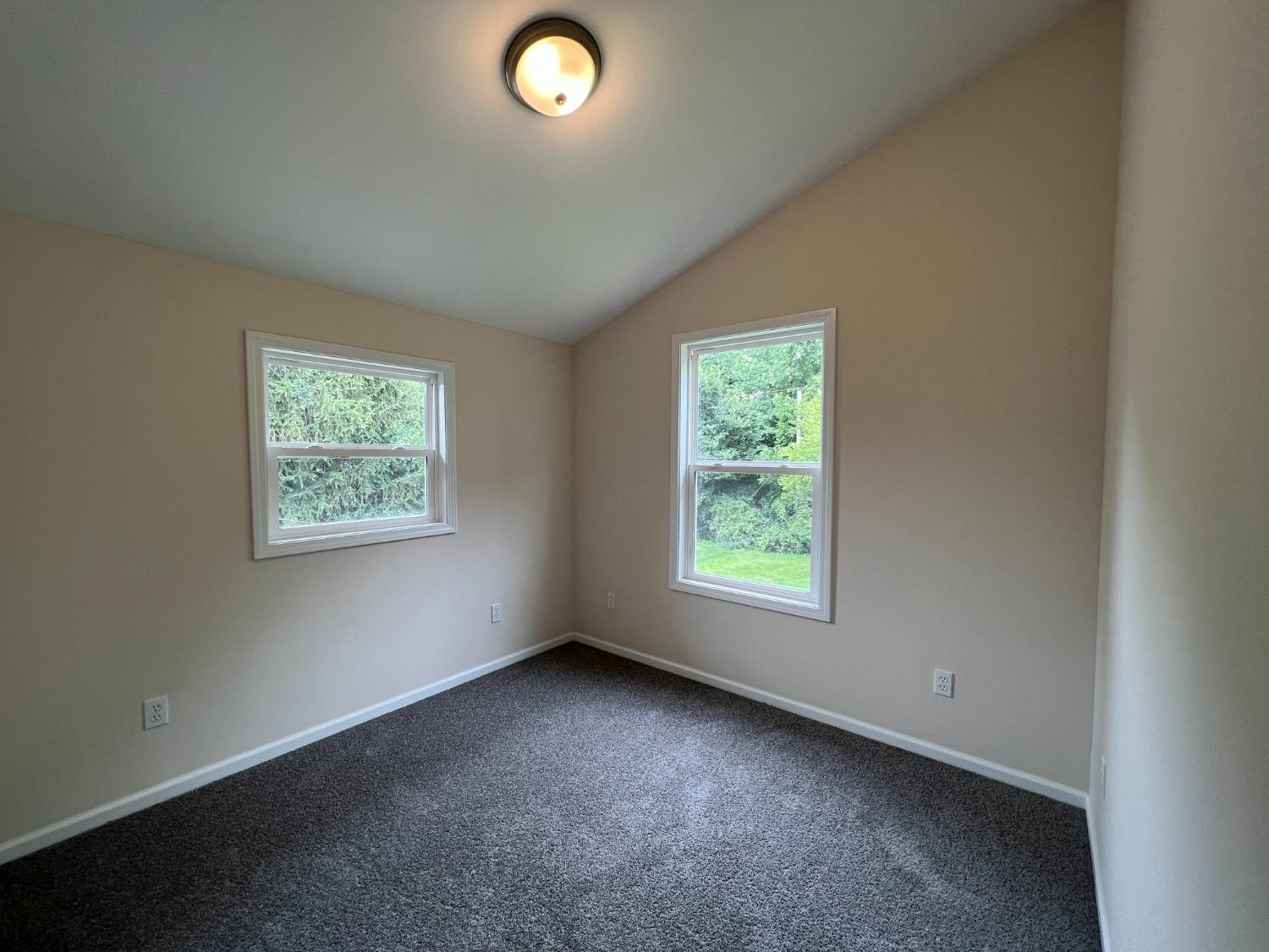 237 Krouser Drive Valparaiso, IN 46385 - Photo 24 of 31 an empty room with windows