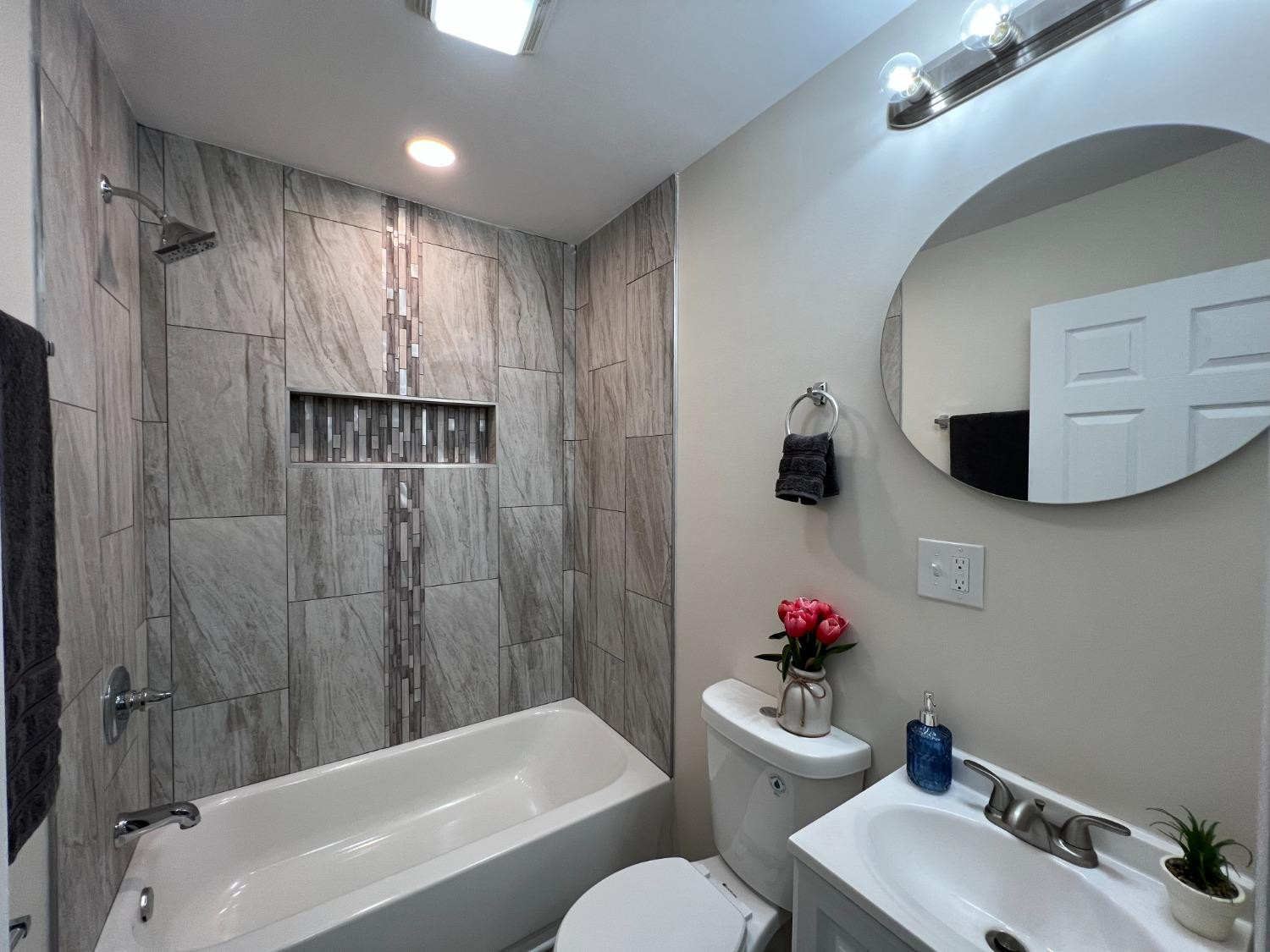 237 Krouser Drive Valparaiso, IN 46385 - Photo 25 of 31 a bathroom with a sink toilet and shower