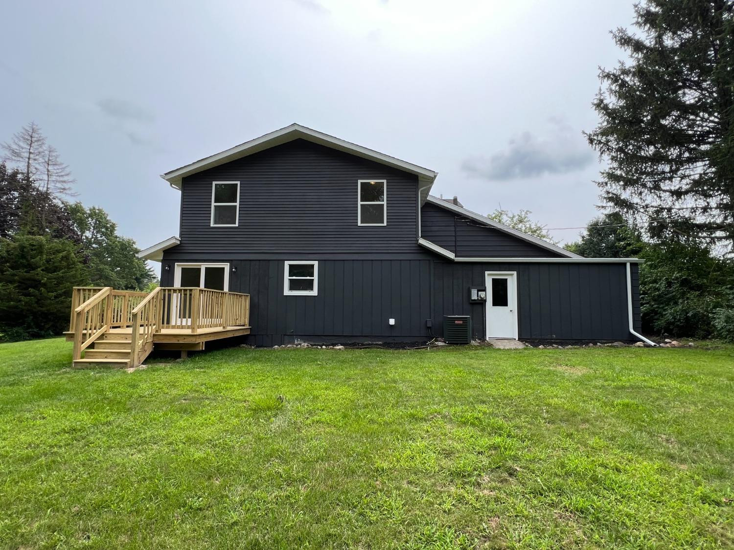 237 Krouser Drive Valparaiso, IN 46385 - Photo 29 of 31 a front view of a house with a yard