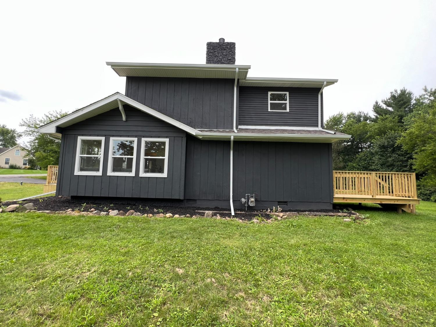 237 Krouser Drive Valparaiso, IN 46385 - Photo 31 of 31 a brick house with garden in front of it