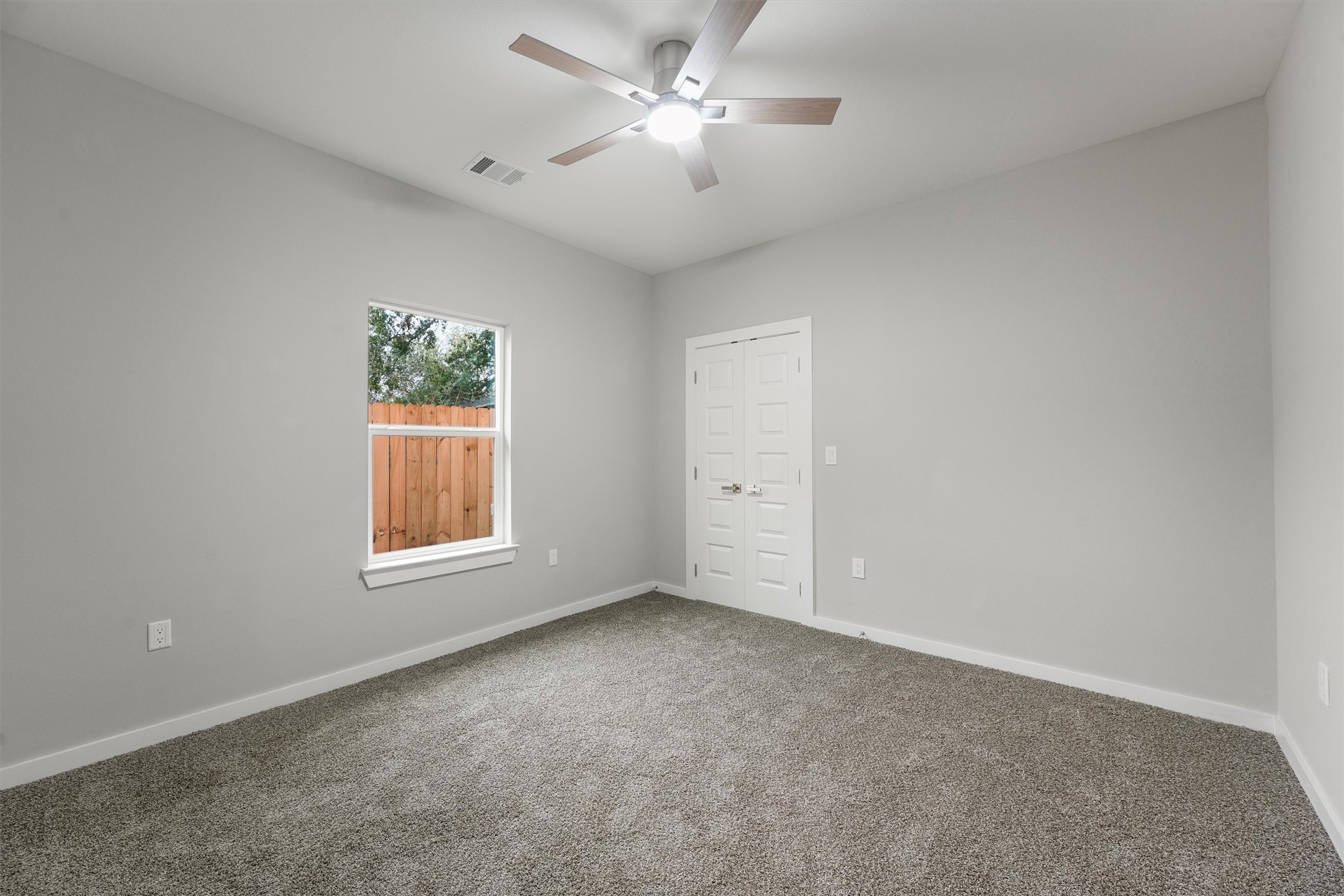 1208 Richard Avenue Pasadena, TX 77506 - Photo 18 of 27 an empty room with a window and a fan