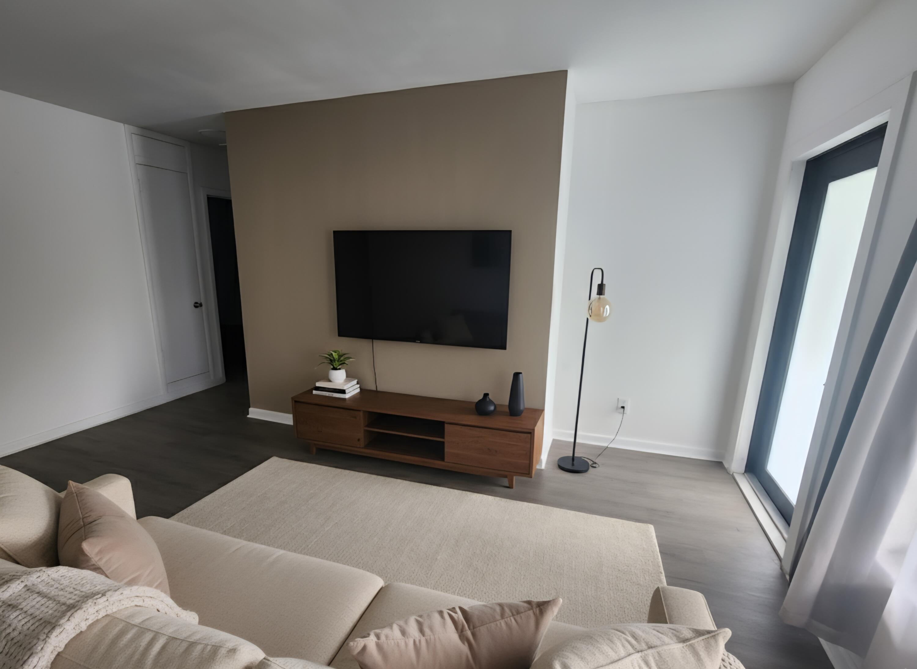 664 West 2nd Street Riviera Beach, FL 33404 - Photo 8 of 10 a living room with furniture and a flat screen tv