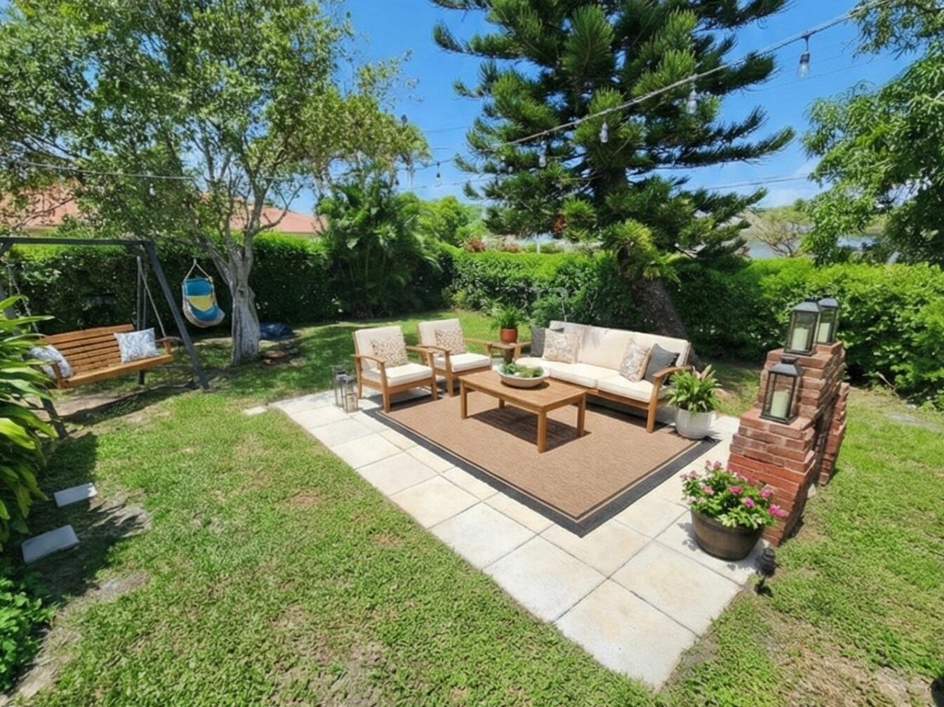 664 West 2nd Street Riviera Beach, FL 33404 - Photo 9 of 10 a view of a backyard with sitting area