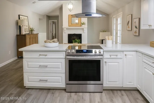 a view of a porch with chairs and backyard
