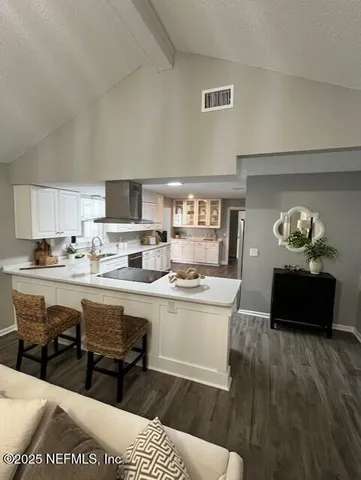 a house view with a garden space