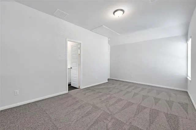 an empty room with an entryway