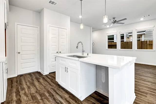 a bathroom with a sink double vanity and a mirror