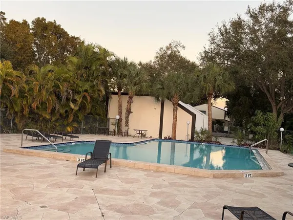 a view of a terrace with chairs