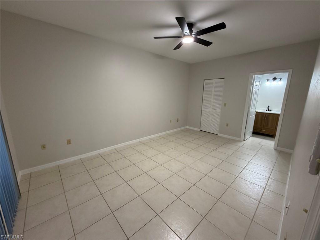 4281 22nd Avenue Southwest, Unit 80 Naples, FL 34116 - Photo 10 of 20 a view of an empty room