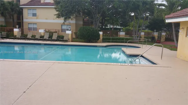 a view of a house with swimming pool