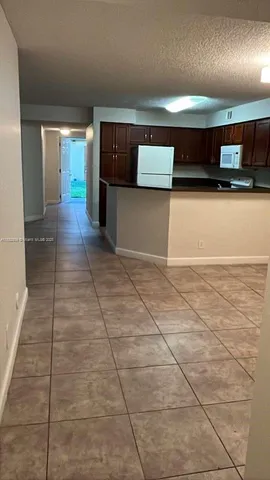 a view of a hallway with an empty space