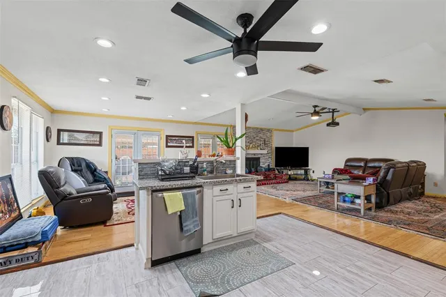 an aerial view of a house with a swimming pool