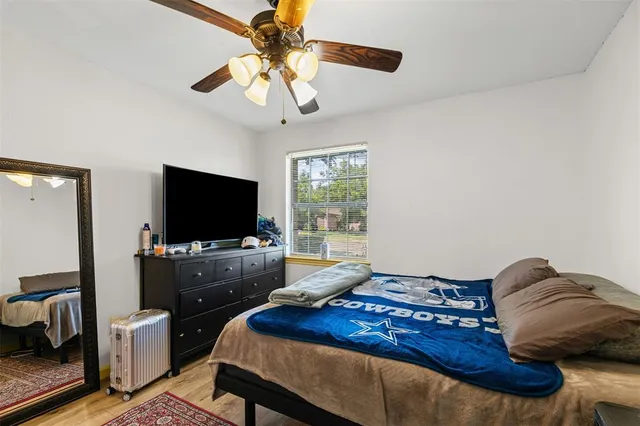 a bathroom with a shower and a bathtub
