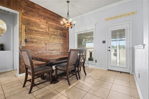 a kitchen with a sink cabinets and window