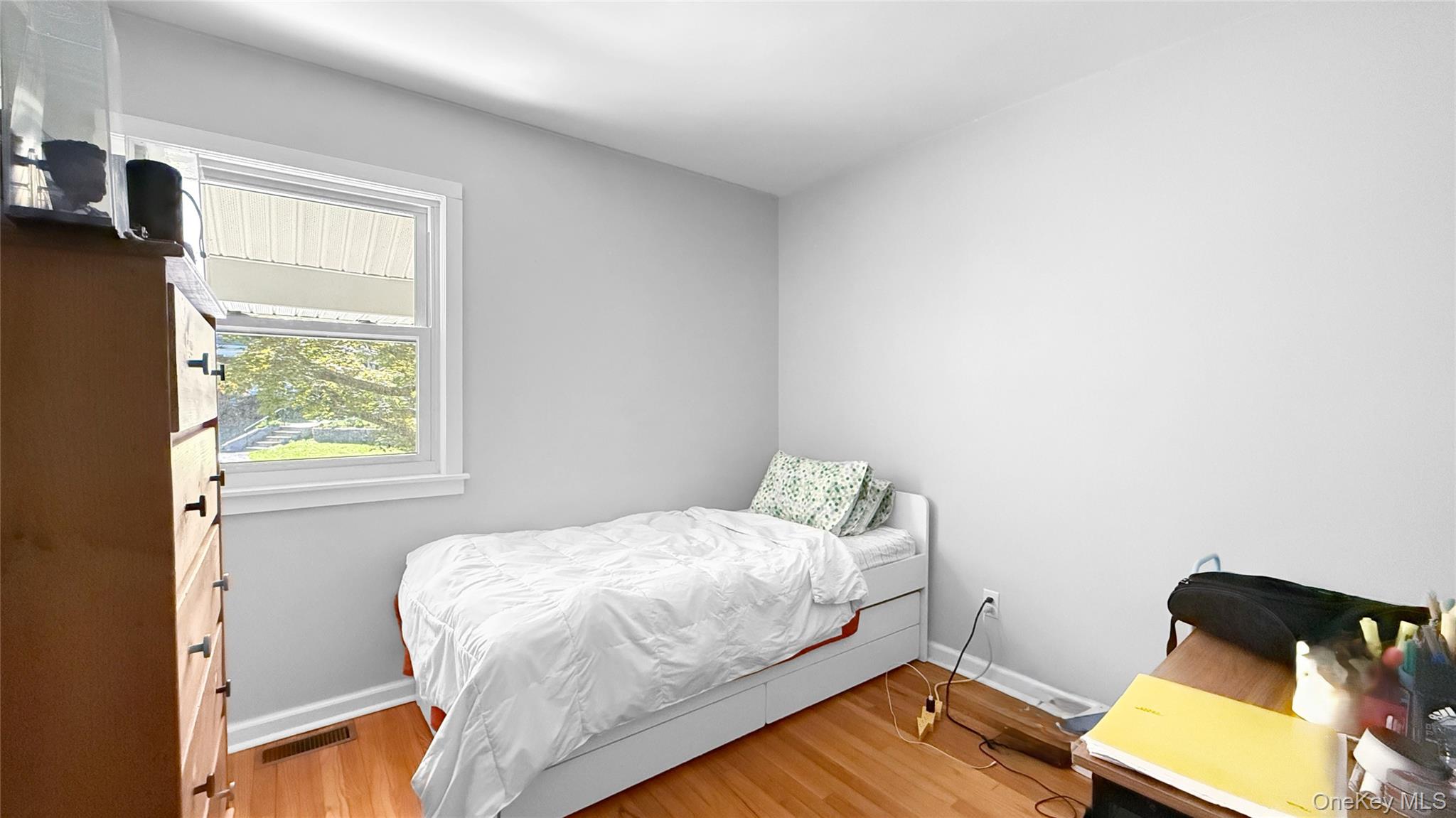 15 Whitehill Place Cold Spring, NY 10516 - Photo 8 of 12 a bedroom with a bed and a window