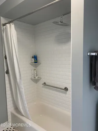 a close view of a bathtub in bathroom