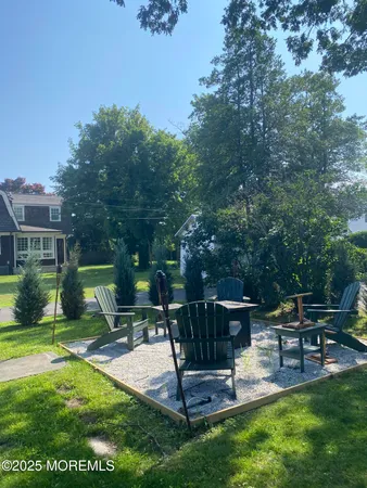 a view of a garden with a bench