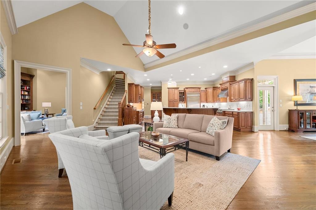 322 Edwards Brook Lane Canton, GA 30115 - Photo 23 of 99 a living room with furniture kitchen view and a wooden floor