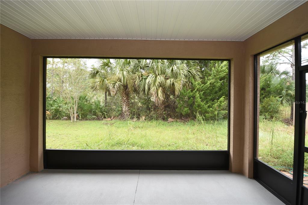 16 Serbian Bellflower Trail, Unit A Palm Coast, FL 32164 - Photo 14 of 41 a room with an outdoor view