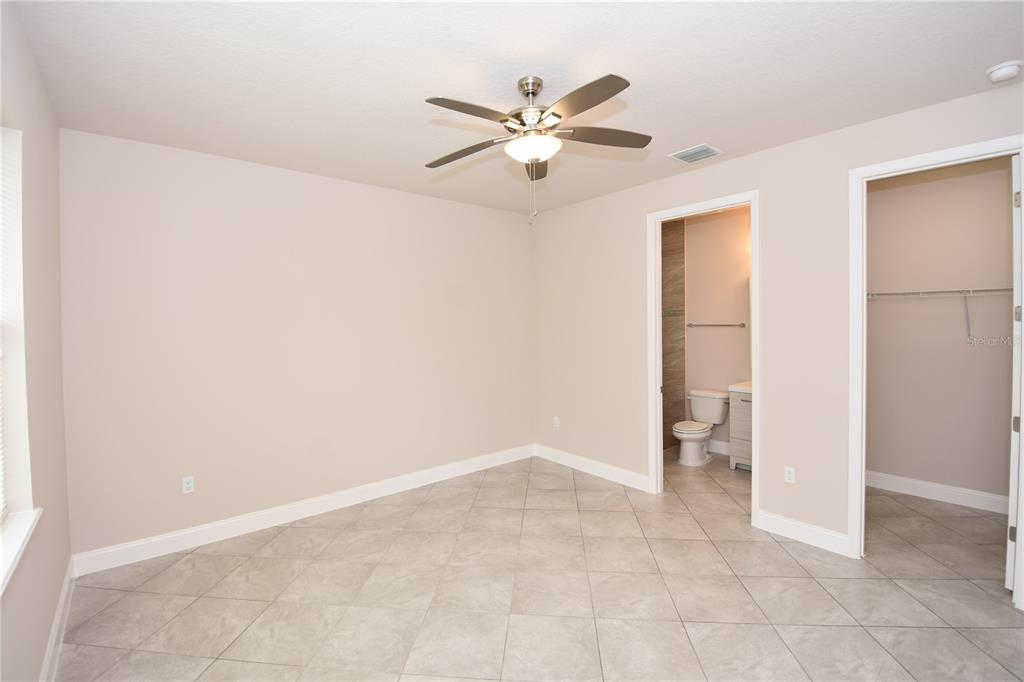16 Serbian Bellflower Trail, Unit A Palm Coast, FL 32164 - Photo 20 of 41 a view of an empty room