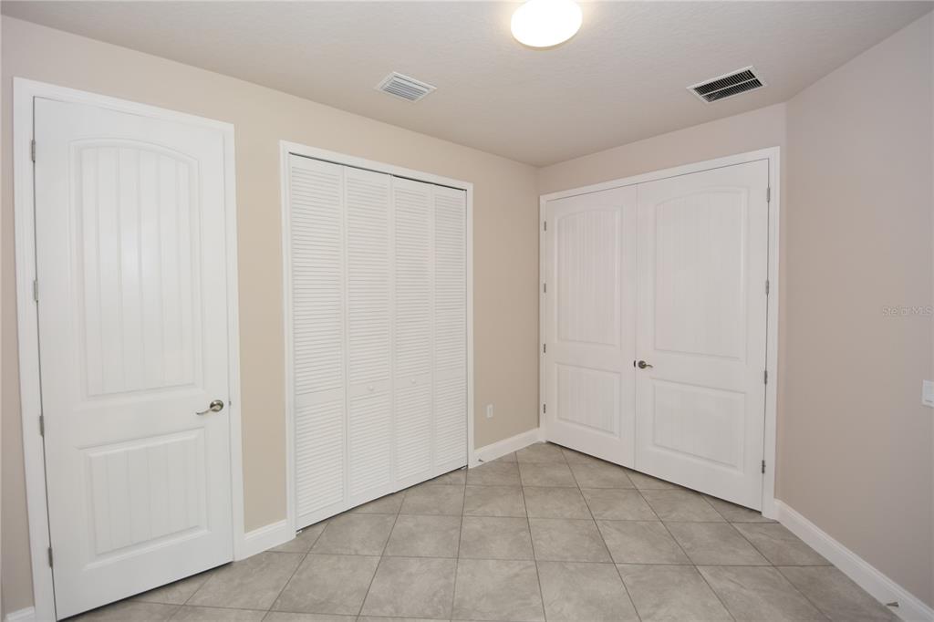16 Serbian Bellflower Trail, Unit A Palm Coast, FL 32164 - Photo 29 of 41 a view of an empty room