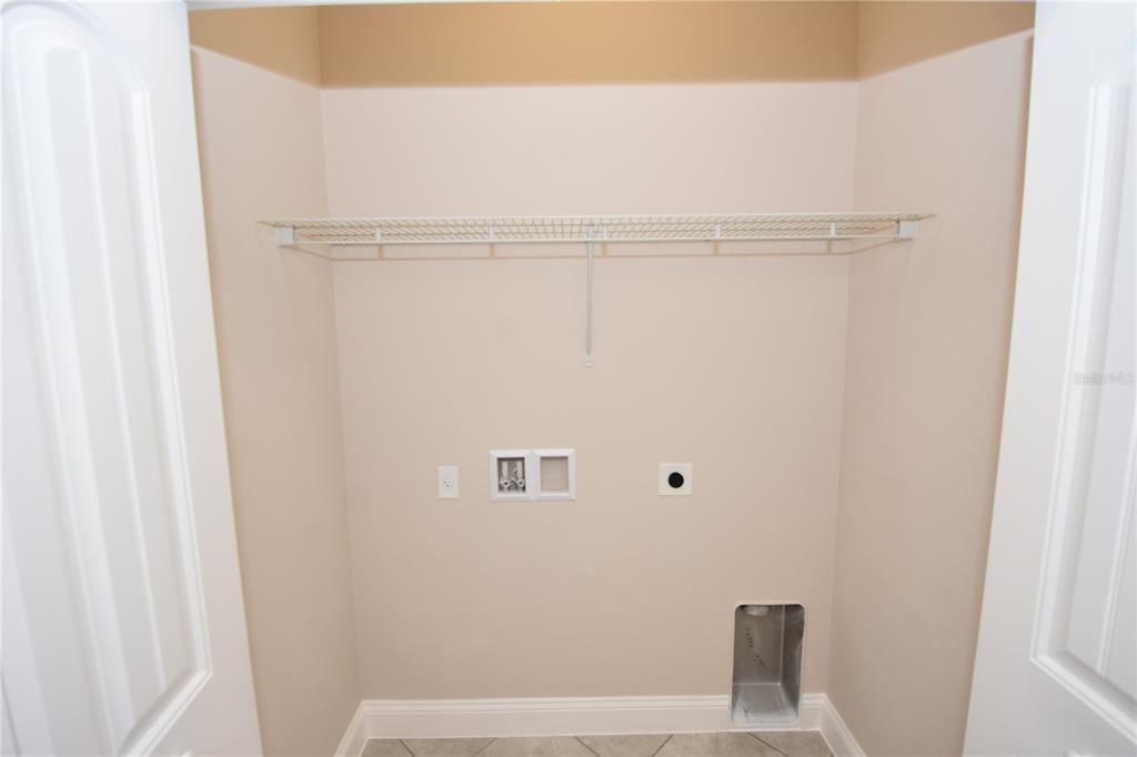 16 Serbian Bellflower Trail, Unit A Palm Coast, FL 32164 - Photo 30 of 41 a bathroom with a shower