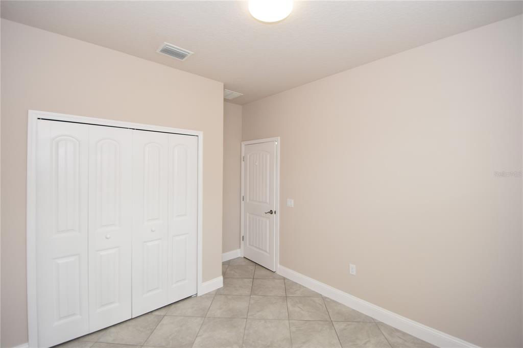 16 Serbian Bellflower Trail, Unit A Palm Coast, FL 32164 - Photo 37 of 41 a view of an empty room
