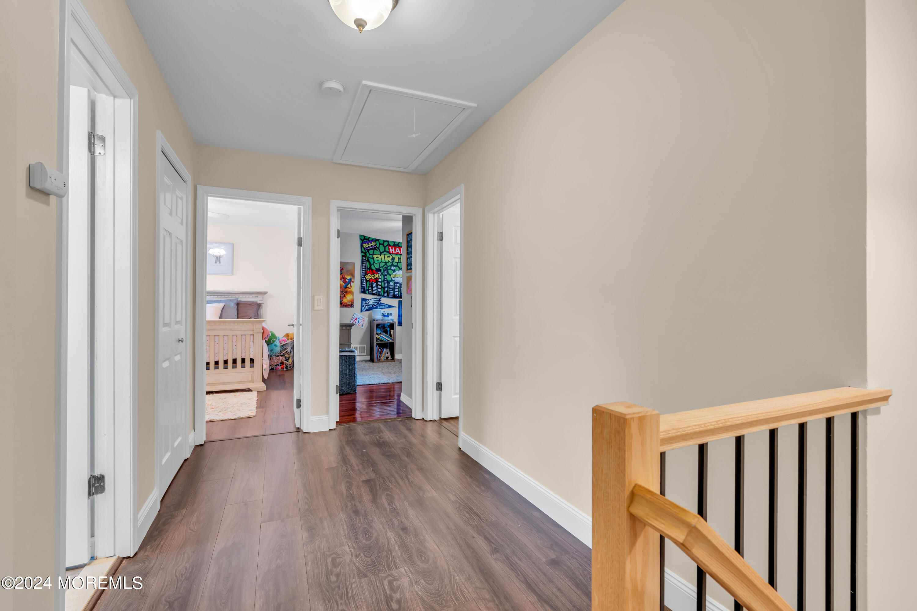 15 Spicy Pond Road Howell, NJ 07731 - Photo 32 of 74 a view of a hallway with wooden floor and closet