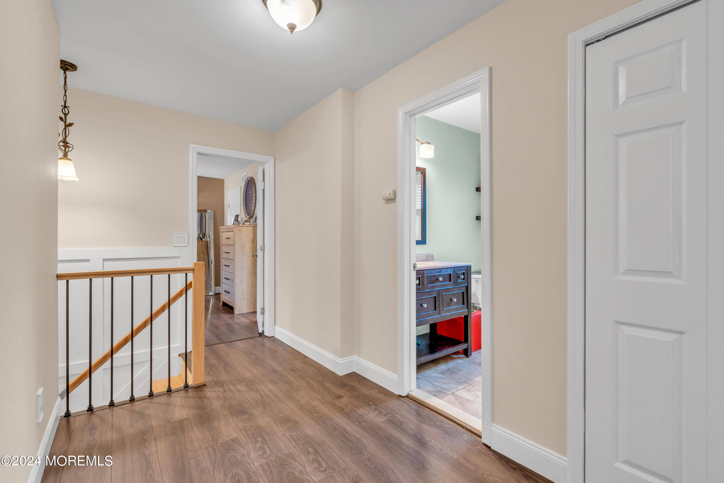 15 Spicy Pond Road Howell, NJ 07731 - Photo 33 of 74 a view of a hallway with wooden floor and entryway