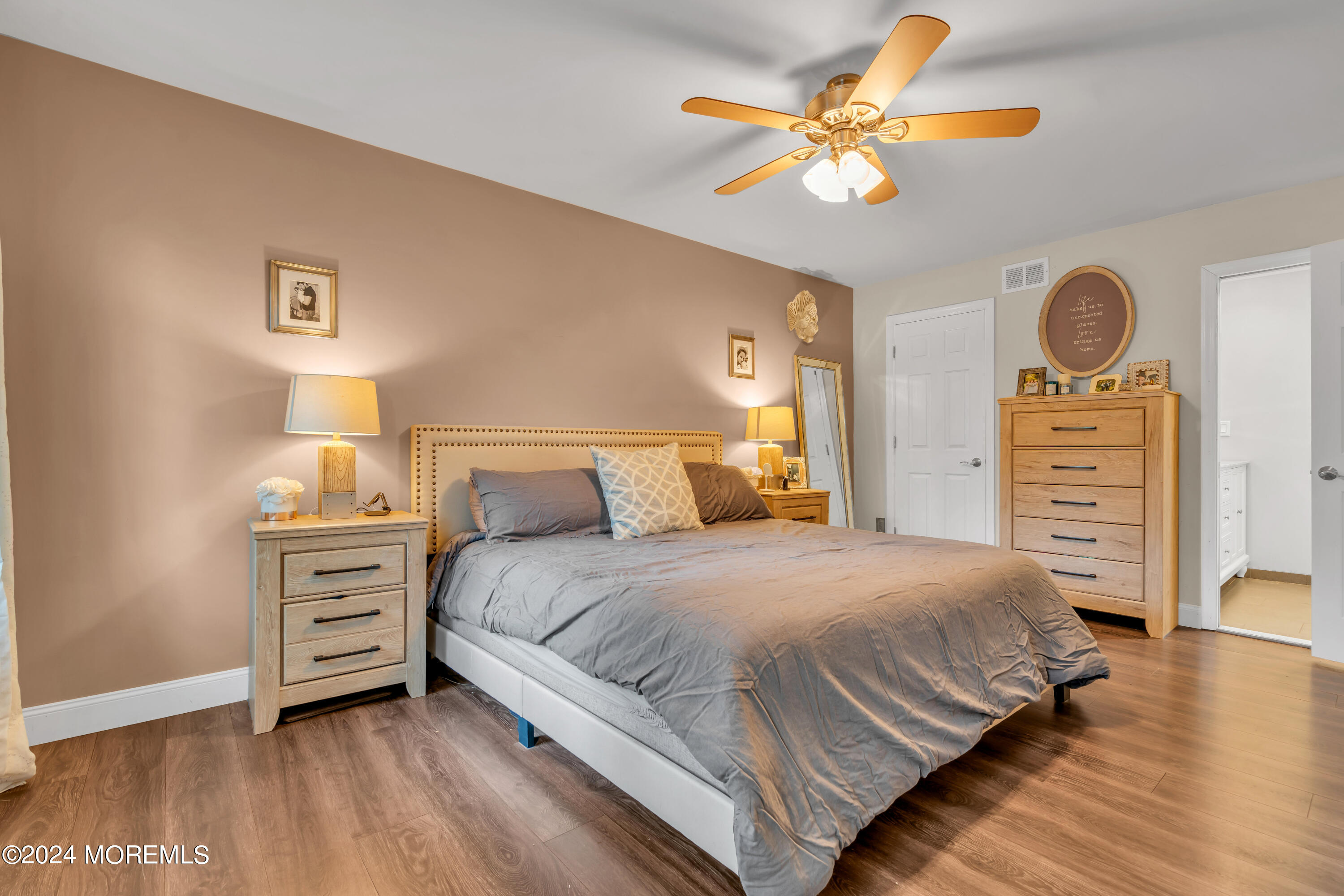 15 Spicy Pond Road Howell, NJ 07731 - Photo 37 of 74 a bedroom with a bed and wooden floor