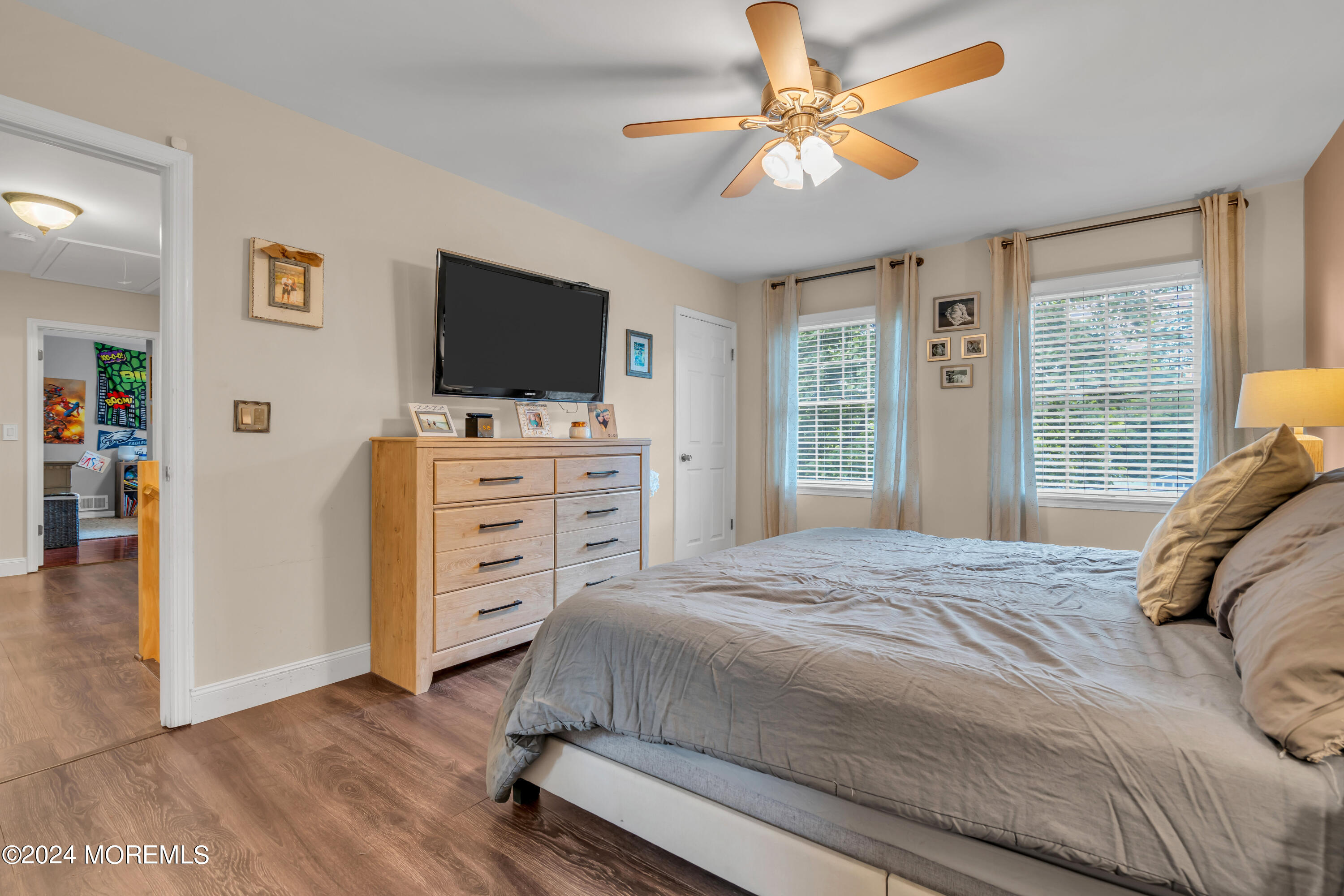 15 Spicy Pond Road Howell, NJ 07731 - Photo 39 of 74 a bedroom with a bed and a flat screen tv