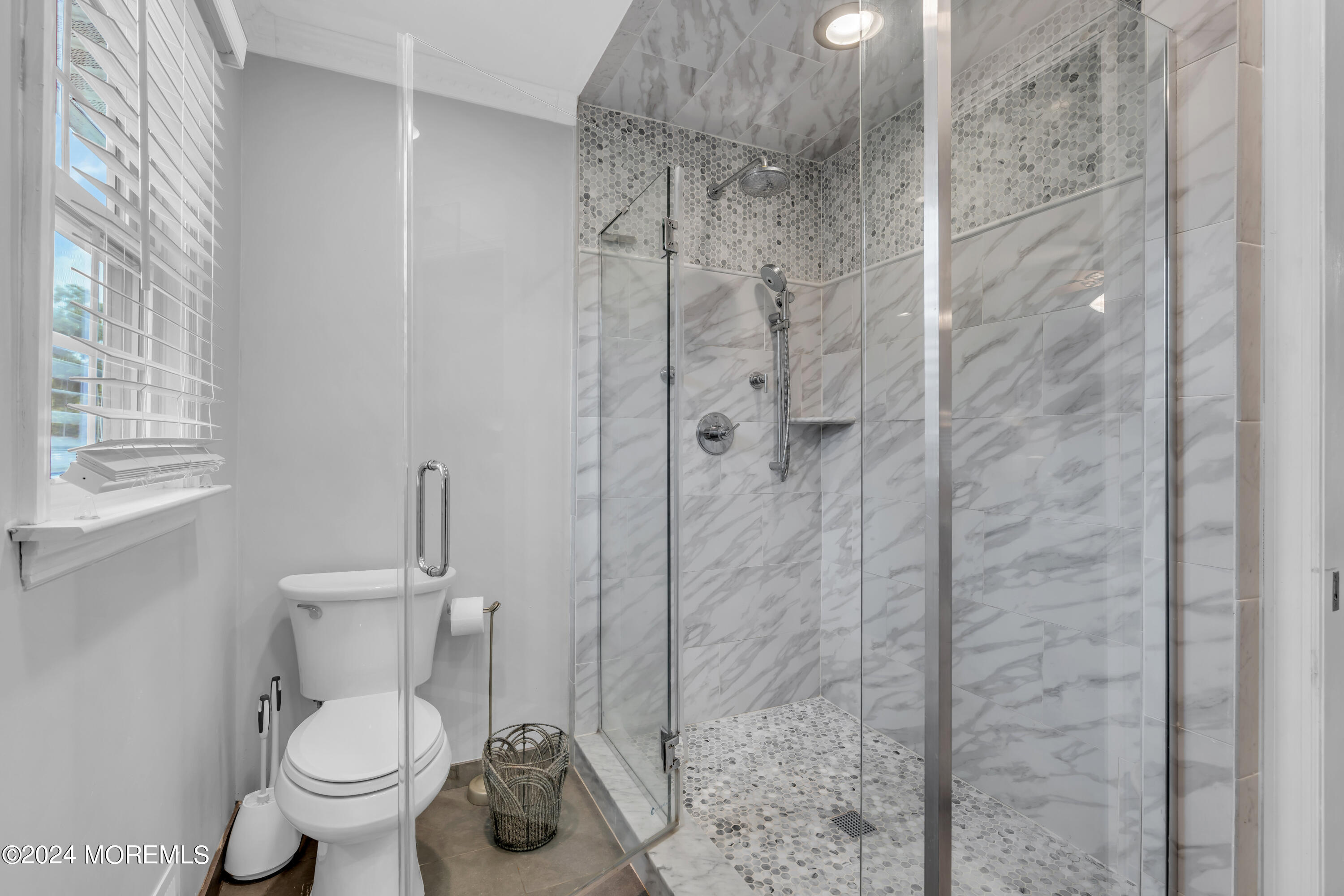 15 Spicy Pond Road Howell, NJ 07731 - Photo 42 of 74 a bathroom with a toilet and a shower