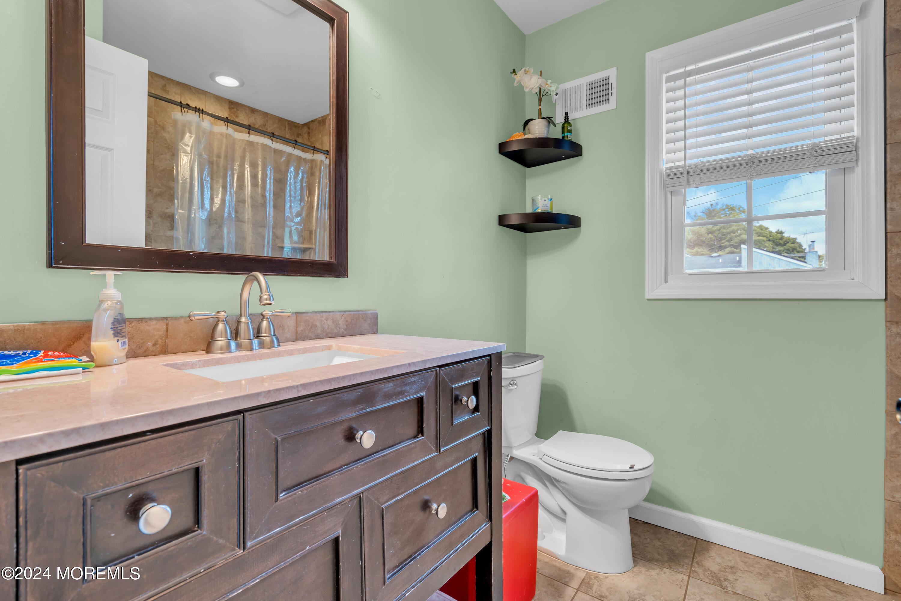 15 Spicy Pond Road Howell, NJ 07731 - Photo 46 of 74 a bathroom with a granite countertop toilet sink and mirror