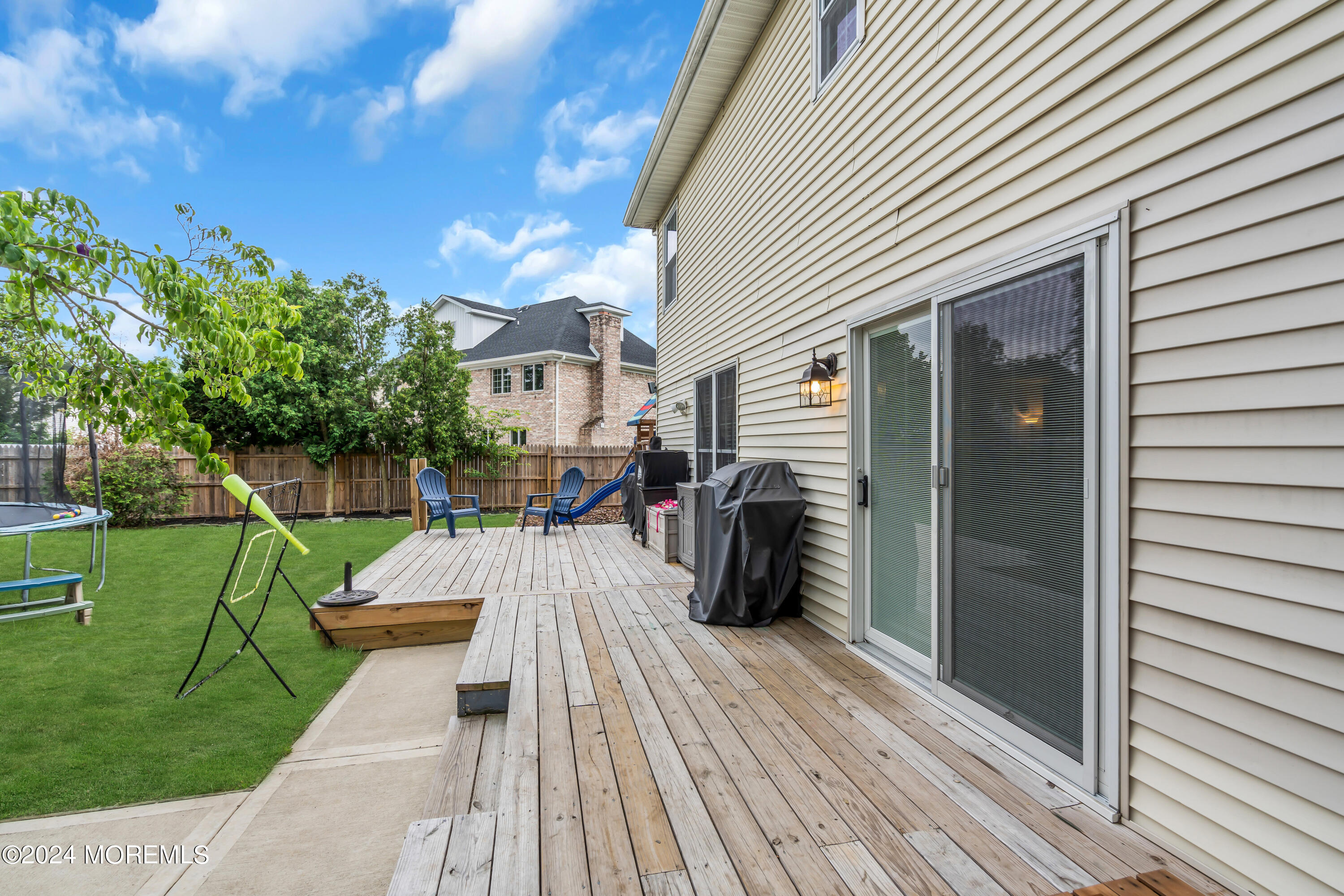 15 Spicy Pond Road Howell, NJ 07731 - Photo 48 of 74 a view of a backyard with sitting area