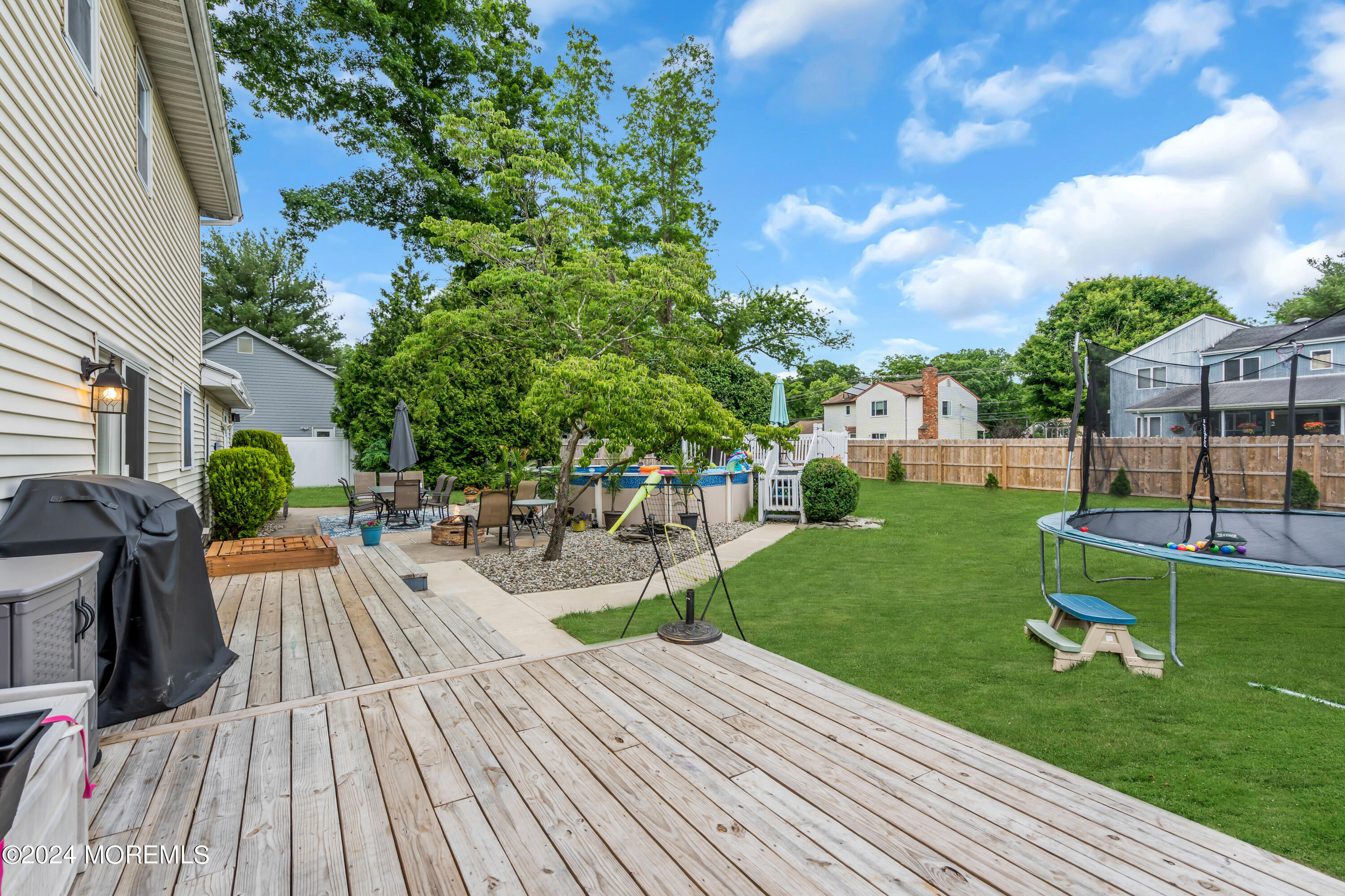 15 Spicy Pond Road Howell, NJ 07731 - Photo 49 of 74 a view of a house with backyard porch and sitting area