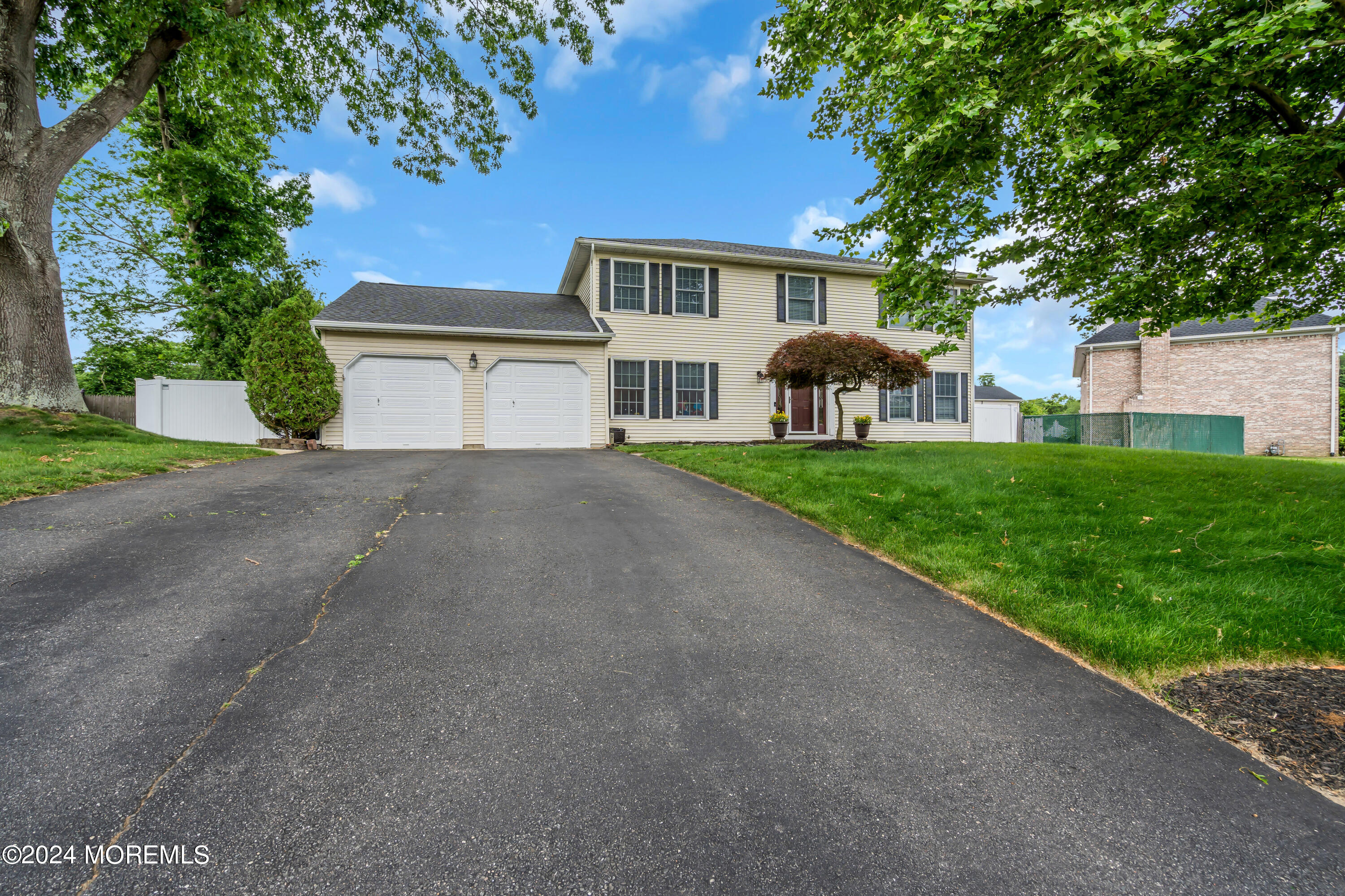 15 Spicy Pond Road Howell, NJ 07731 - Photo 74 of 74 a view of a house with a yard and large tree