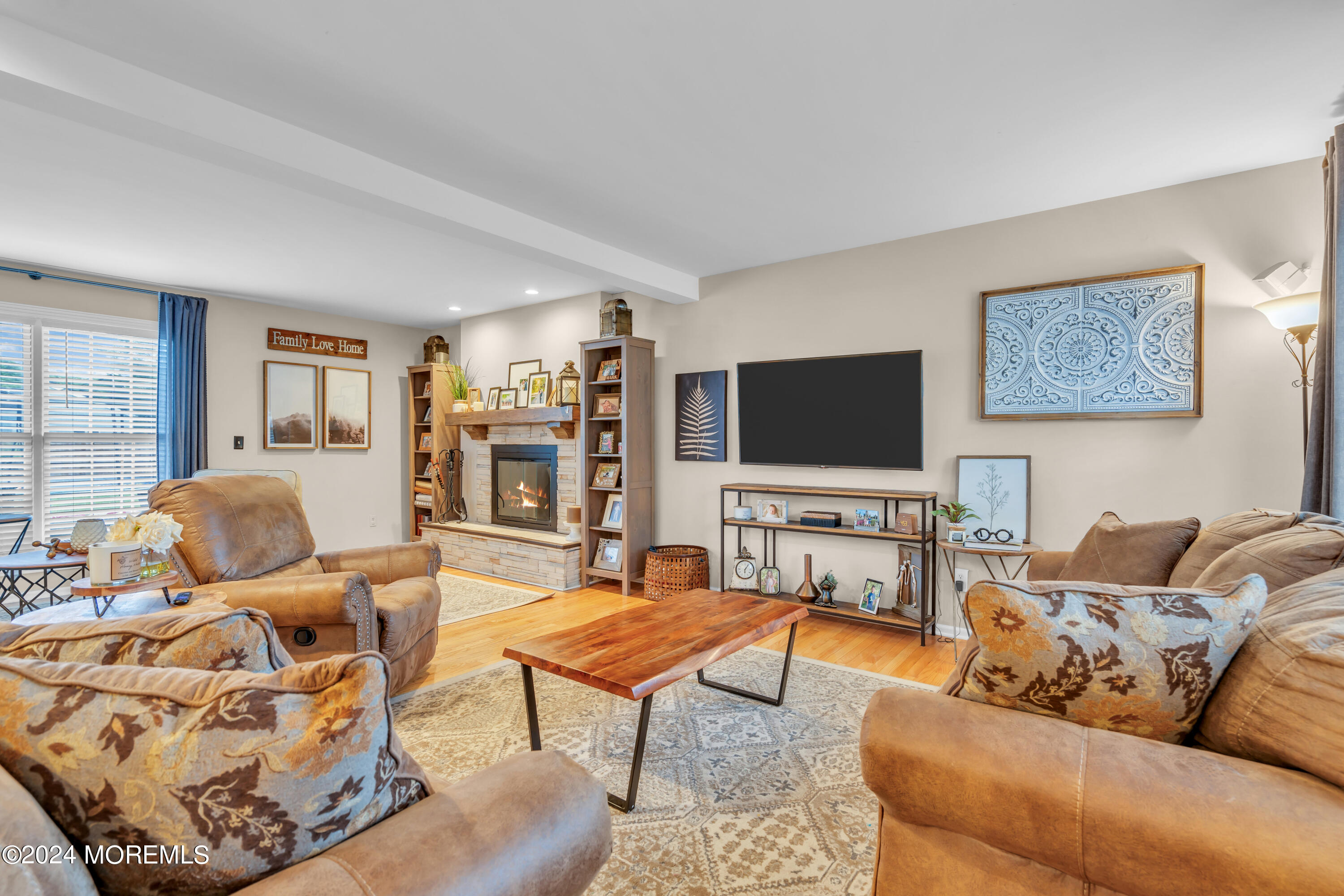 15 Spicy Pond Road Howell, NJ 07731 - Photo 8 of 74 a living room with furniture and a flat screen tv