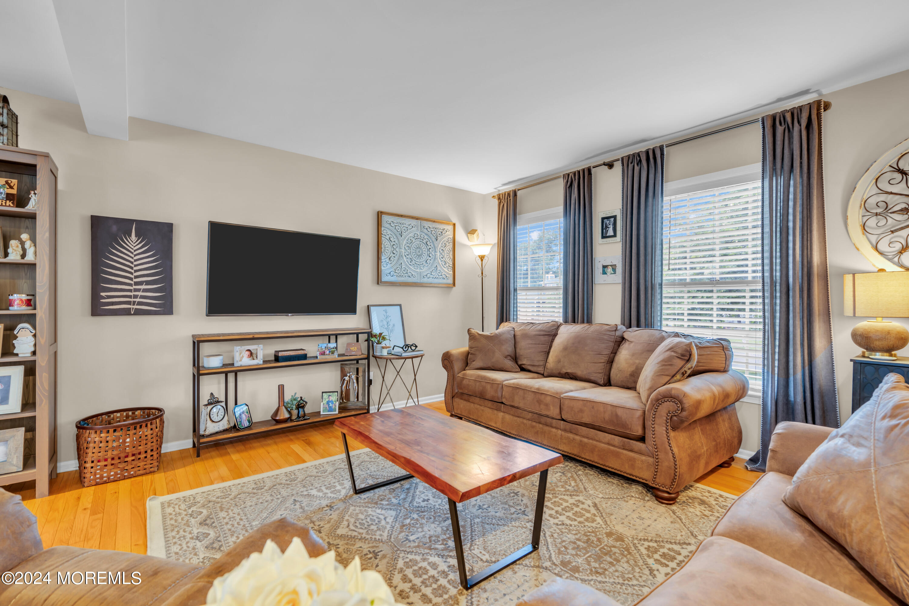 15 Spicy Pond Road Howell, NJ 07731 - Photo 9 of 74 a living room with furniture and a flat screen tv
