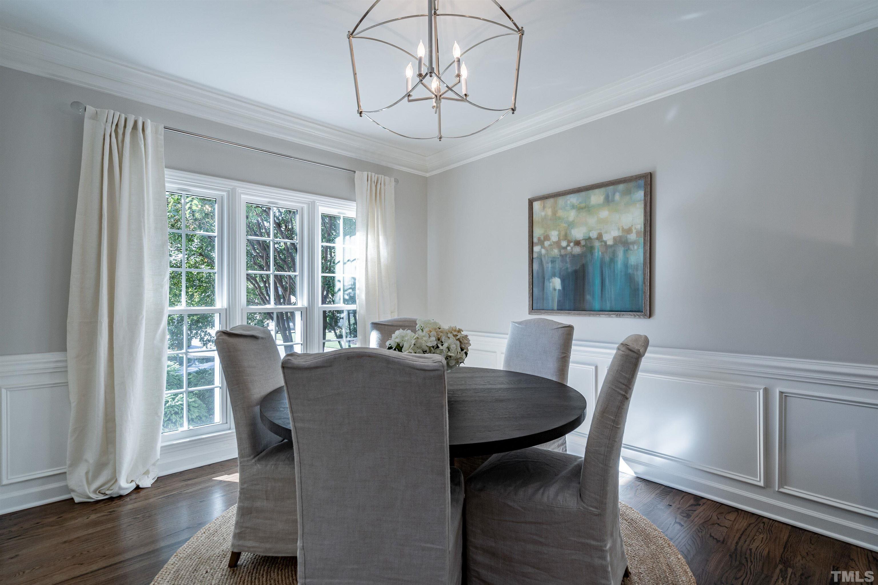 2420 Havershire Drive Raleigh, NC 27613 - Photo 3 of 25 a view of a dining room with furniture window and wooden floor