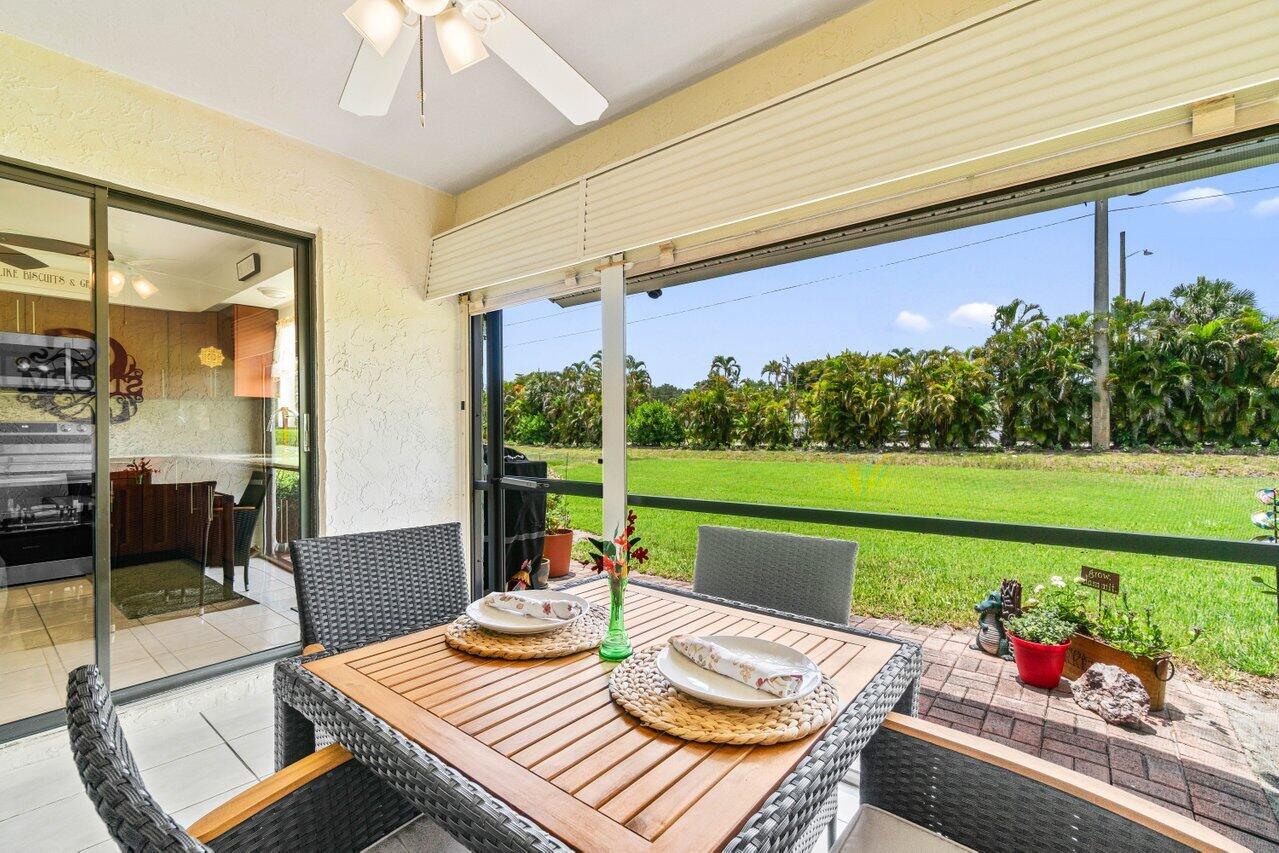4260 Mango Tree Court, Unit B Boynton Beach, FL 33436 - Photo 21 of 35 a outdoor space with furniture