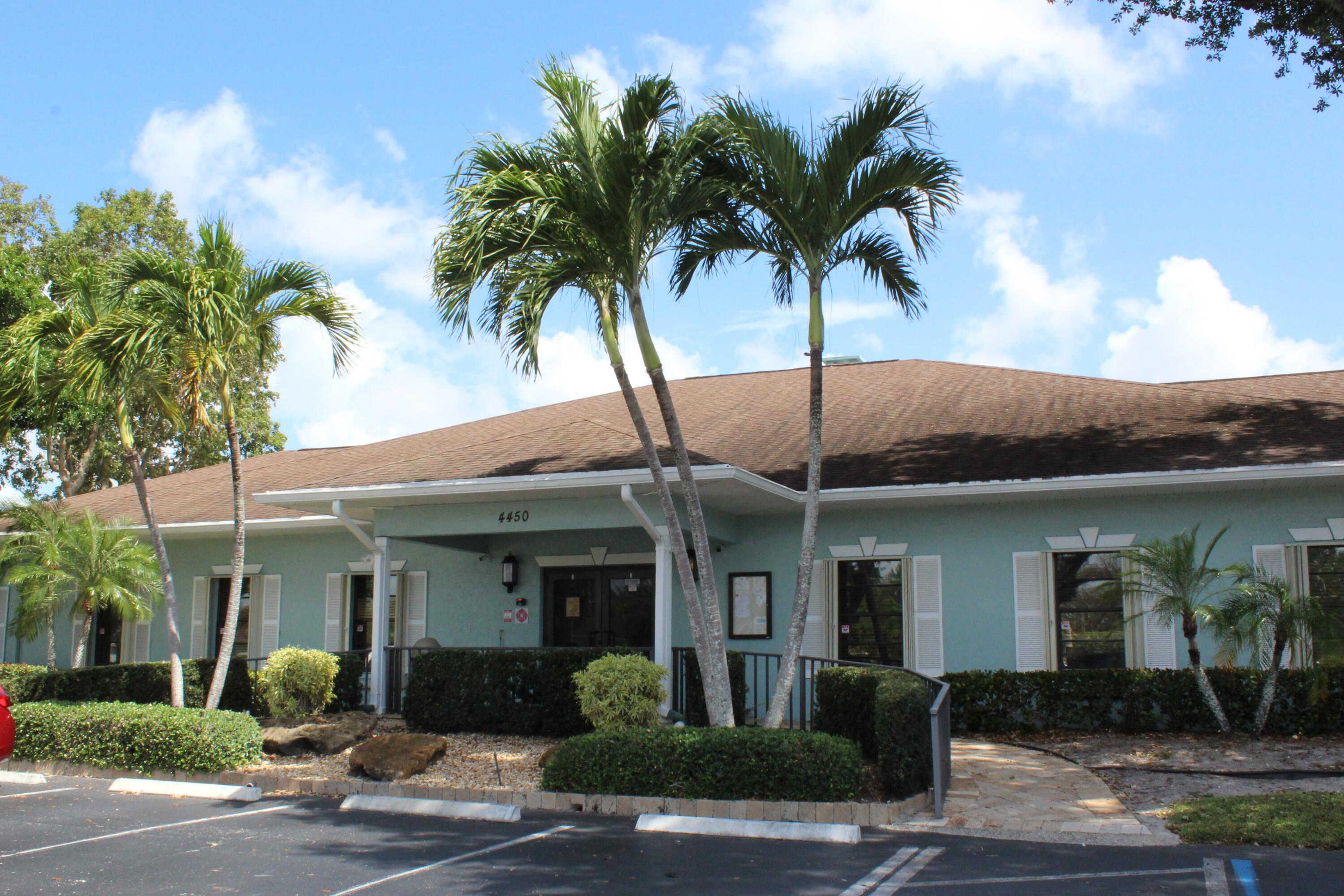 4260 Mango Tree Court, Unit B Boynton Beach, FL 33436 - Photo 35 of 35 a front view of a house with a tree