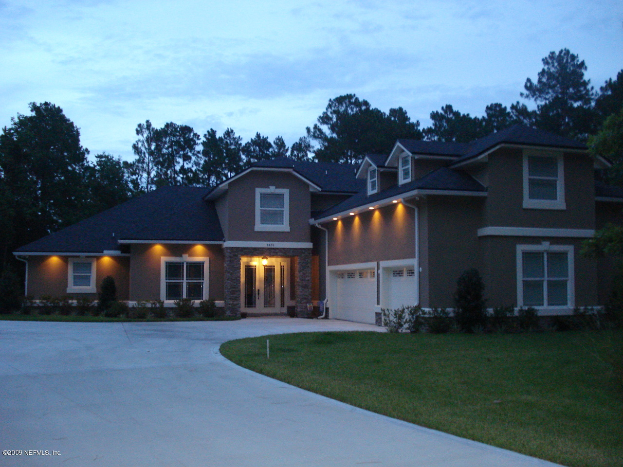 1435 Sheffield Road St. Johns, FL 32259 - Photo 1 of 42 a front view of a house with a yard and trees