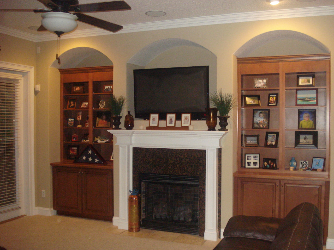 1435 Sheffield Road St. Johns, FL 32259 - Photo 6 of 42 a living room with furniture a flat screen tv and a fireplace