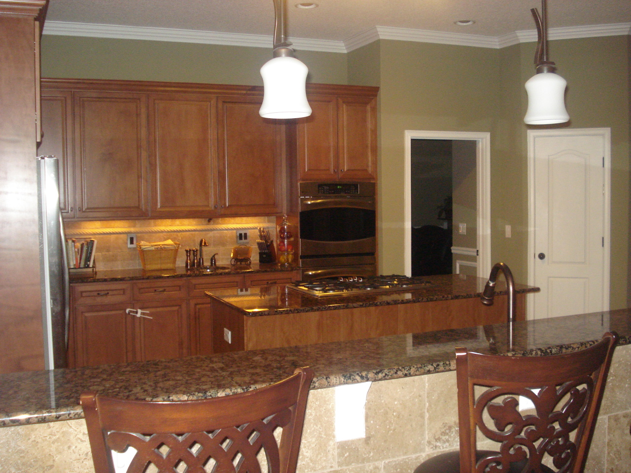 1435 Sheffield Road St. Johns, FL 32259 - Photo 10 of 42 a kitchen with stainless steel appliances granite countertop a sink and a refrigerator