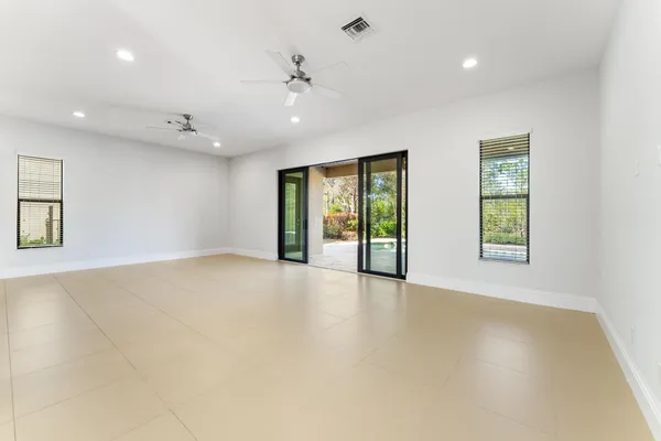 a view of a livingroom with a kitchen